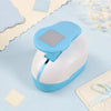 A light blue stamp edge paper punch tool is shown next to decorative square stamp edge paper.