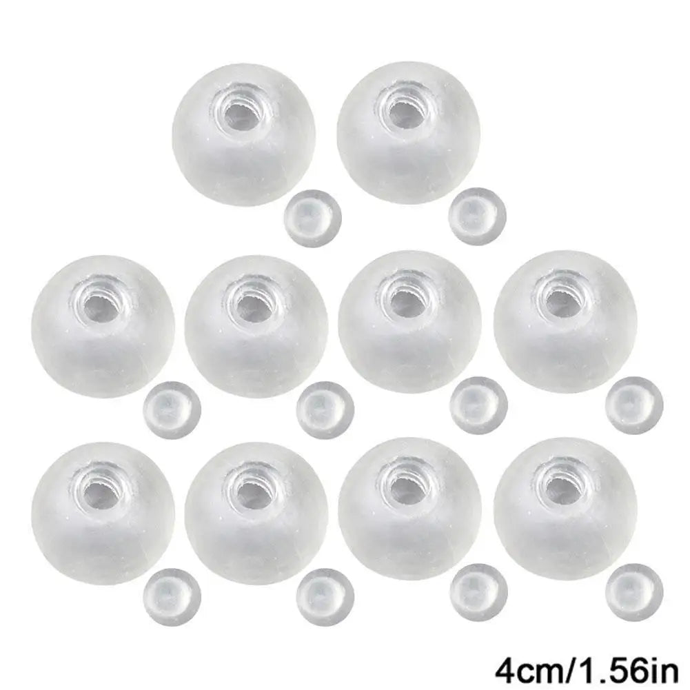 A collection of clear, round squishy stress ball covers with visible screw threads.