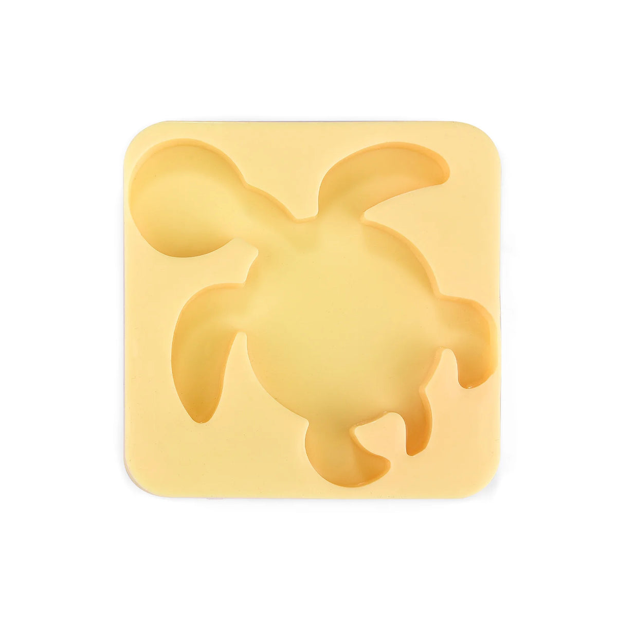 A yellow silicone mold shaped like a stylized elf for a DIY craft kit.
