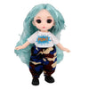 A light blue-haired articulated BJD princess doll wearing a white shirt with a blue explosion design and camouflage pants.