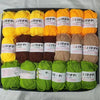 A pack of 20 skeins of various colored yarn including yellow, orange, brown, and green wool for knitting and crafts