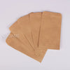 A stack of mini kraft paper gift bags in various sizes, used for party favors or weddings.