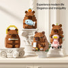 A set of wooden building blocks depicting cute teddy bears and a fish, displayed on a white surface.