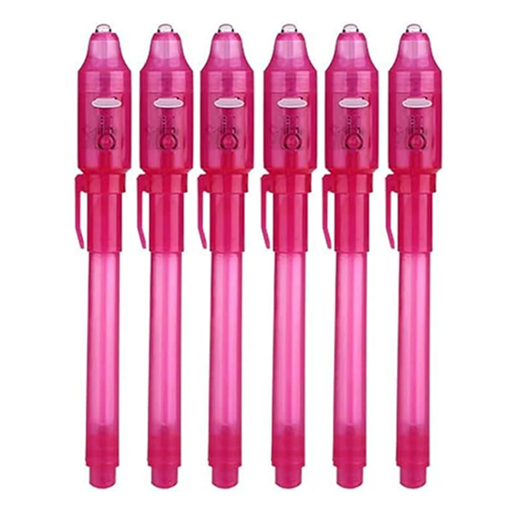 A set of pink invisible ink spy pens with UV light for secret messages
