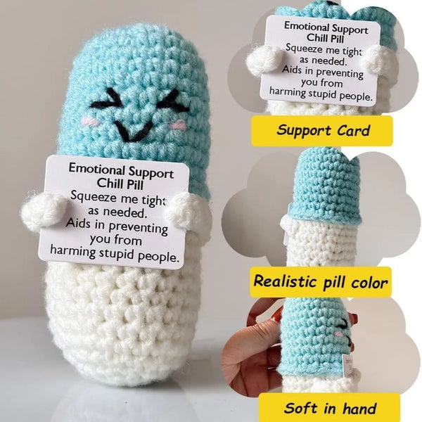 Handmade crochet emotional support charm shaped like a pill in light blue and white