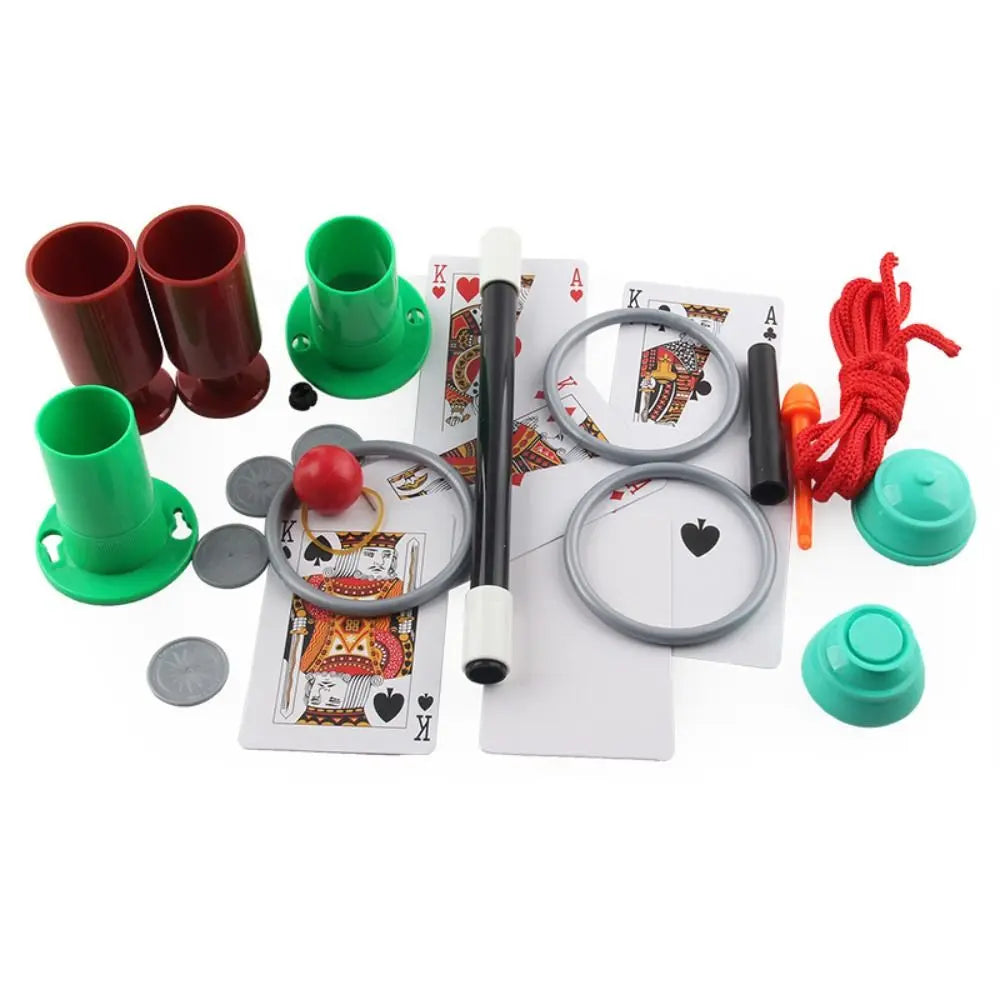 A beginner magic kit for kids showing various props like colored tubes, a wand, and cards with instructions.