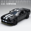 A black Dodge Challenger SRT Hellcat diecast model car with white racing stripes on a white background.