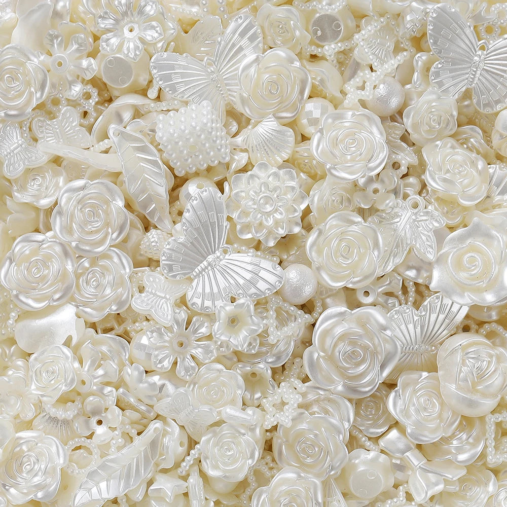 Close-up of clear and iridescent butterfly shell acrylic beads used for DIY jewelry making