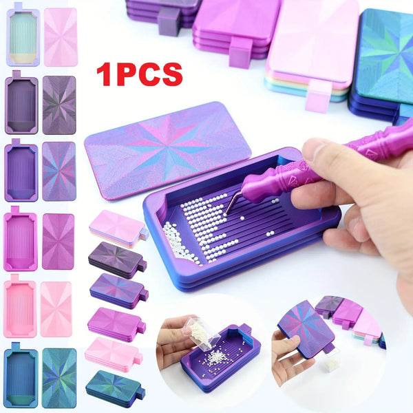 A colorful diamond painting tray with a lid shown in various shades and colors, including purple, pink, green, and blue.