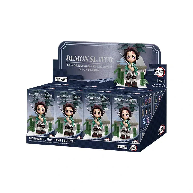 A box of Demon Slayer Unwavering Resolve Arc collectible blind box figures featuring characters from the series.