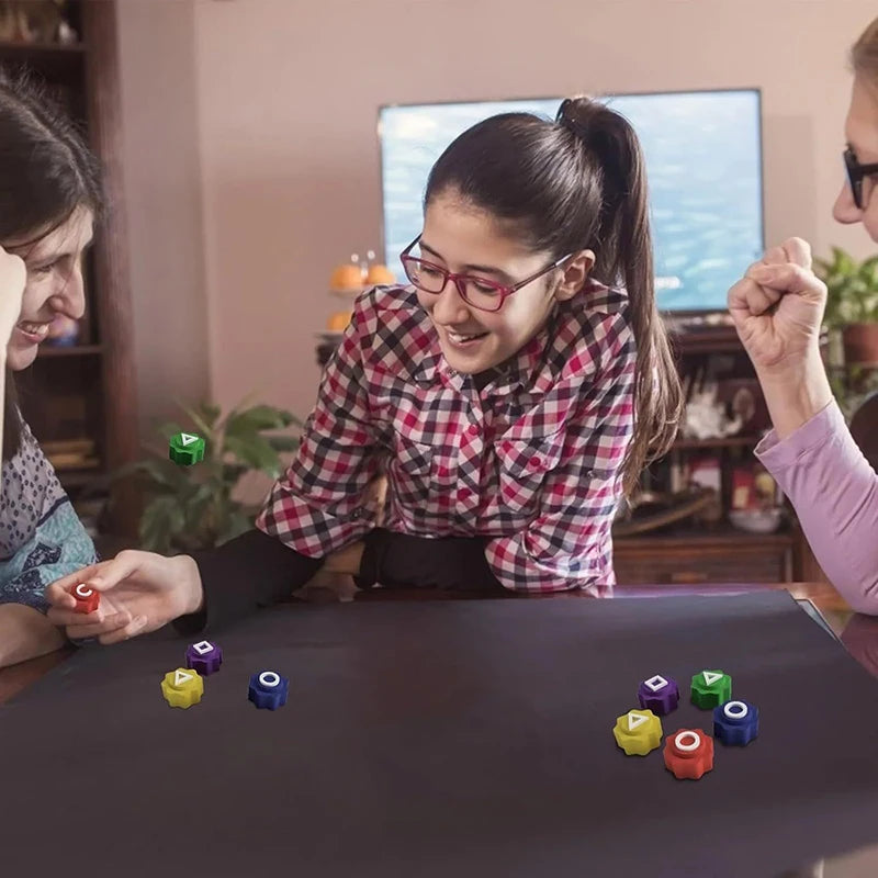 A girl is playing the Traditional Korean Gonggi Stone Game with several colored pebbles on a dark table.