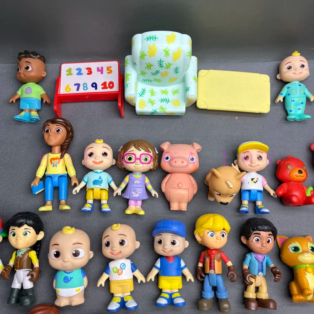 A collection of colorful Playful Cartoon PVC figurines featuring various characters and designs.