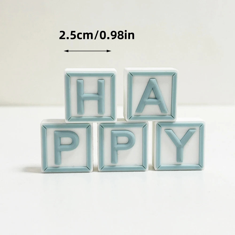 A set of light blue wooden alphabet blocks spelling HAPPY, measuring 2.5cm or 0.98in.