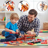 A man and a child play with an orange kids pretend play tool set featuring an electric drill on a colorful mat.