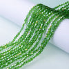 Green faceted glass crystal beads in a twisted strand for jewelry making