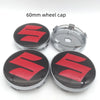 Four 60mm Suzuki wheel cap covers shown in various views