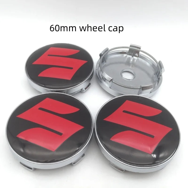 Four 60mm Suzuki wheel cap covers shown in various views