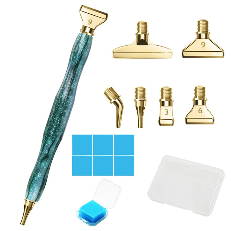 A set of diamond painting pens featuring interchangeable metal tips and multi-placers with gold-colored components.