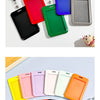 A collection of colorful retractable ID badge holders with keychains and clips displayed on a white background.