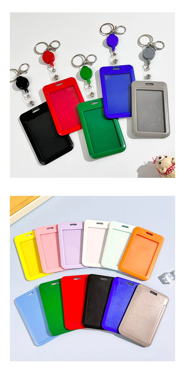 A collection of colorful retractable ID badge holders with keychains and clips displayed on a white background.