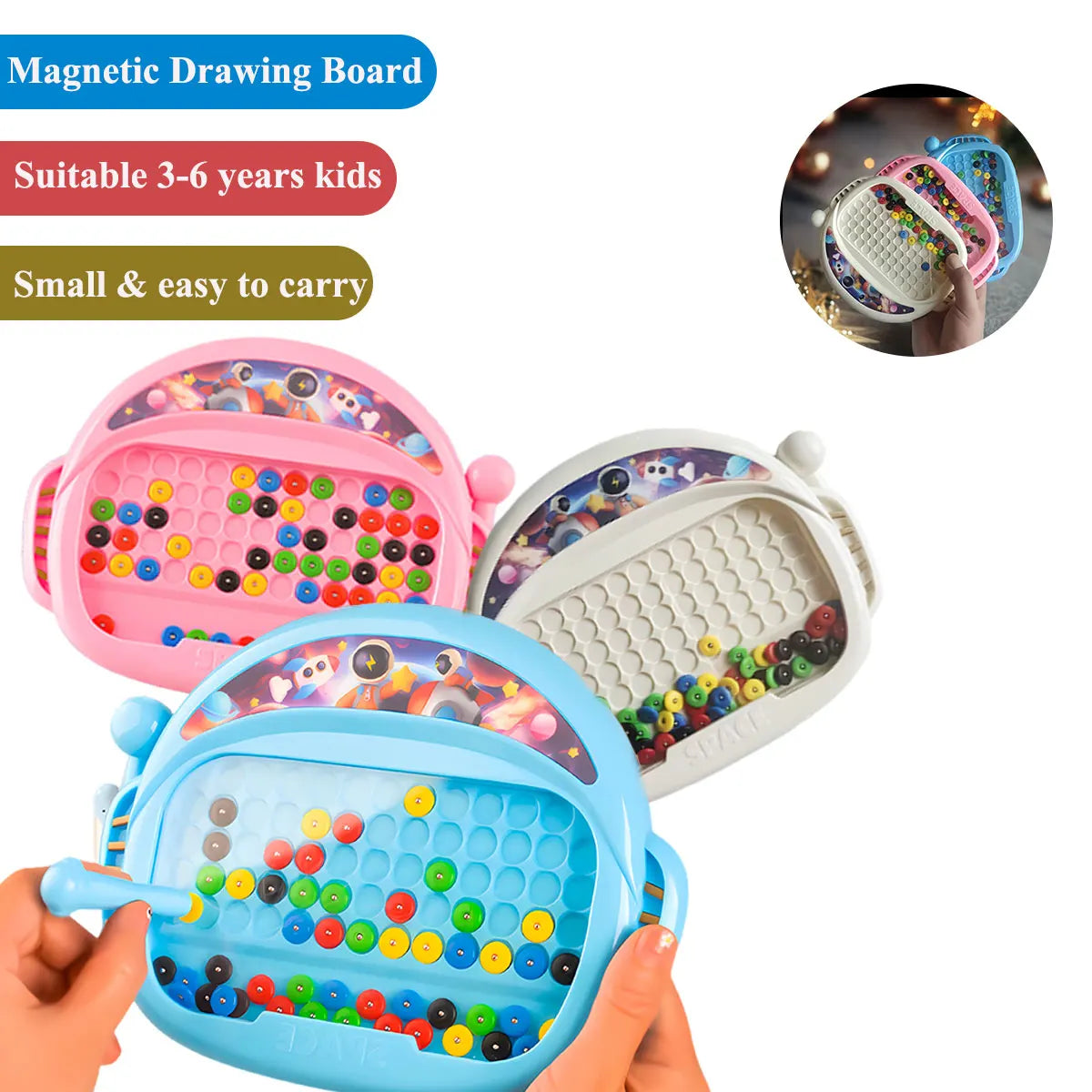 A child's pink and blue magnetic drawing board filled with colorful beads and a pen, shown being held.