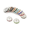 A collection of 12mm crystal rhinestone spacer beads in various colors and cuts for jewelry making.