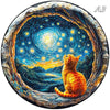 A wooden 3D puzzle of an orange cat peeking out from a starry, arched frame.
