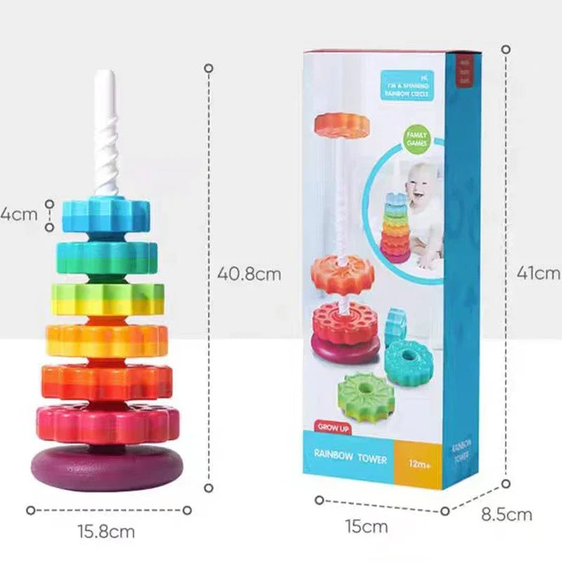 A colorful rainbow tower of stacking rings for toddlers, shown next to its packaging.