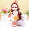 A 17cm articulated princess doll with long brown hair and a white fluffy dress-up outfit.