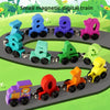 A colorful magnetic digital train set featuring various numbered cars in blue, purple, pink, green, and yellow.