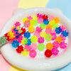 A pile of 300 translucent bead mix in various bright colors is displayed in a white dish.