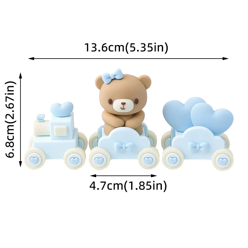 A light blue 3D bear cake topper featuring a teddy bear figure and cloud accents for a birthday or baby shower.