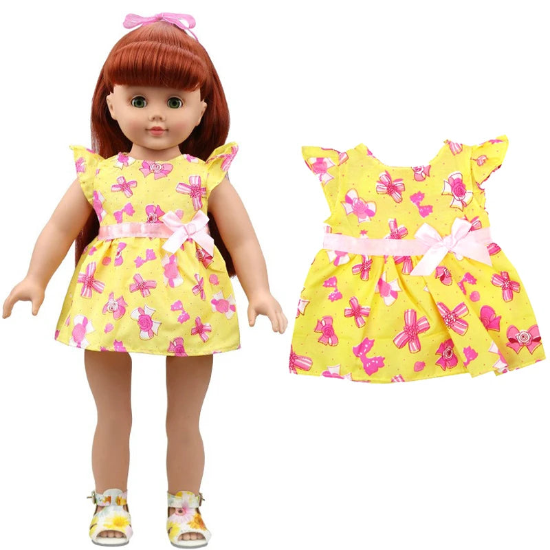 A doll wearing a yellow floral dress with pink accents and a pink bow, shown next to the outfit components.