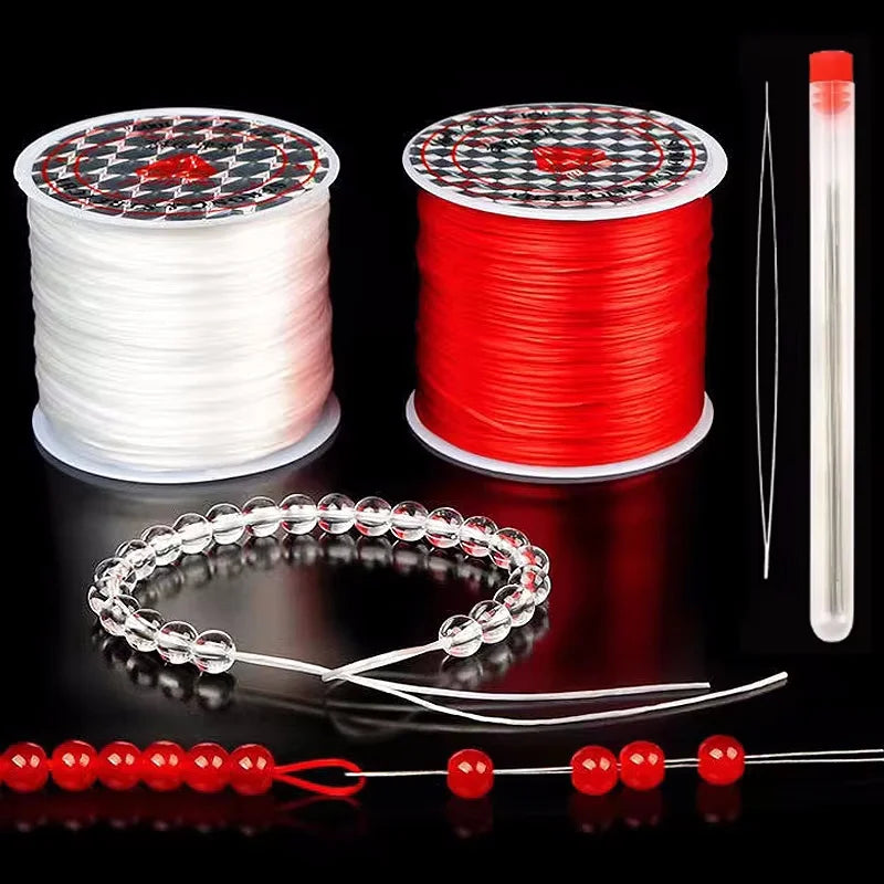 A set of red and white elastic beading cord, including a spool and finished bracelets and necklaces.