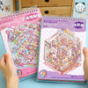 A pink and purple 3D stacked miniature collage book titled Simulated Construction Game Book for scrapbooking.