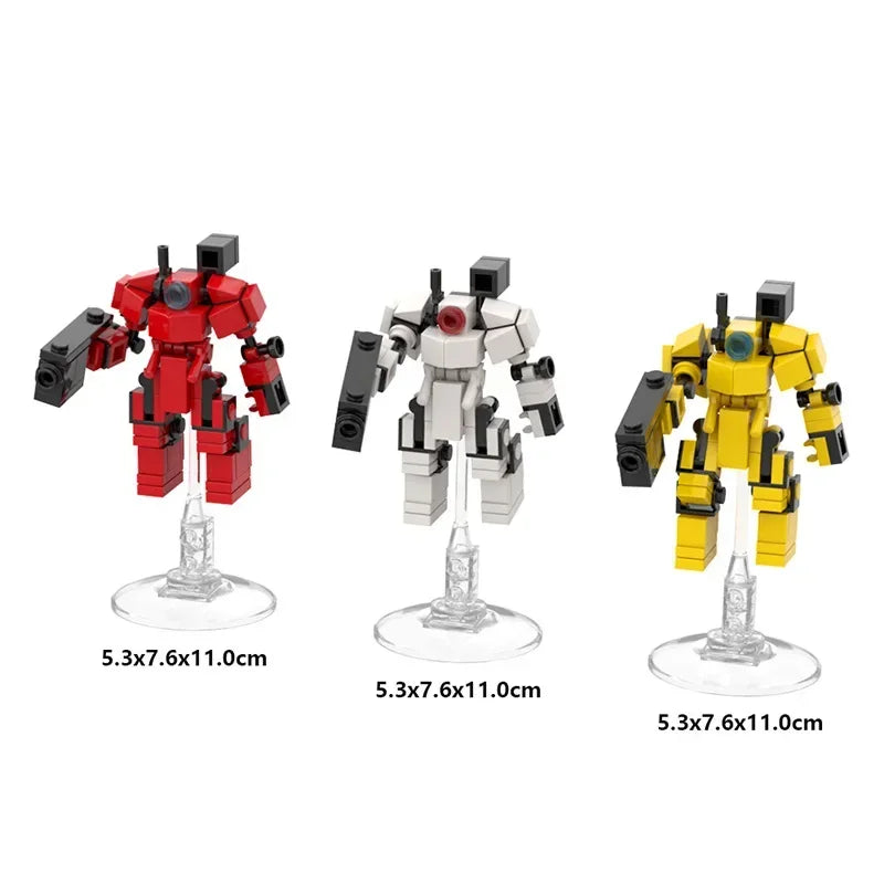 A set of three combat robot exoskeletons made from building blocks in red, gray, and yellow.