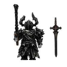 A black magnetic metal figurine of an adjudicator with horns and a sword.