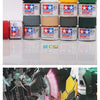A collection of matte acrylic paint pots in various colors and shades for model kits and miniatures.