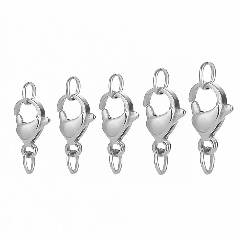 A set of silver stainless steel lobster clasps and jewelry connectors.