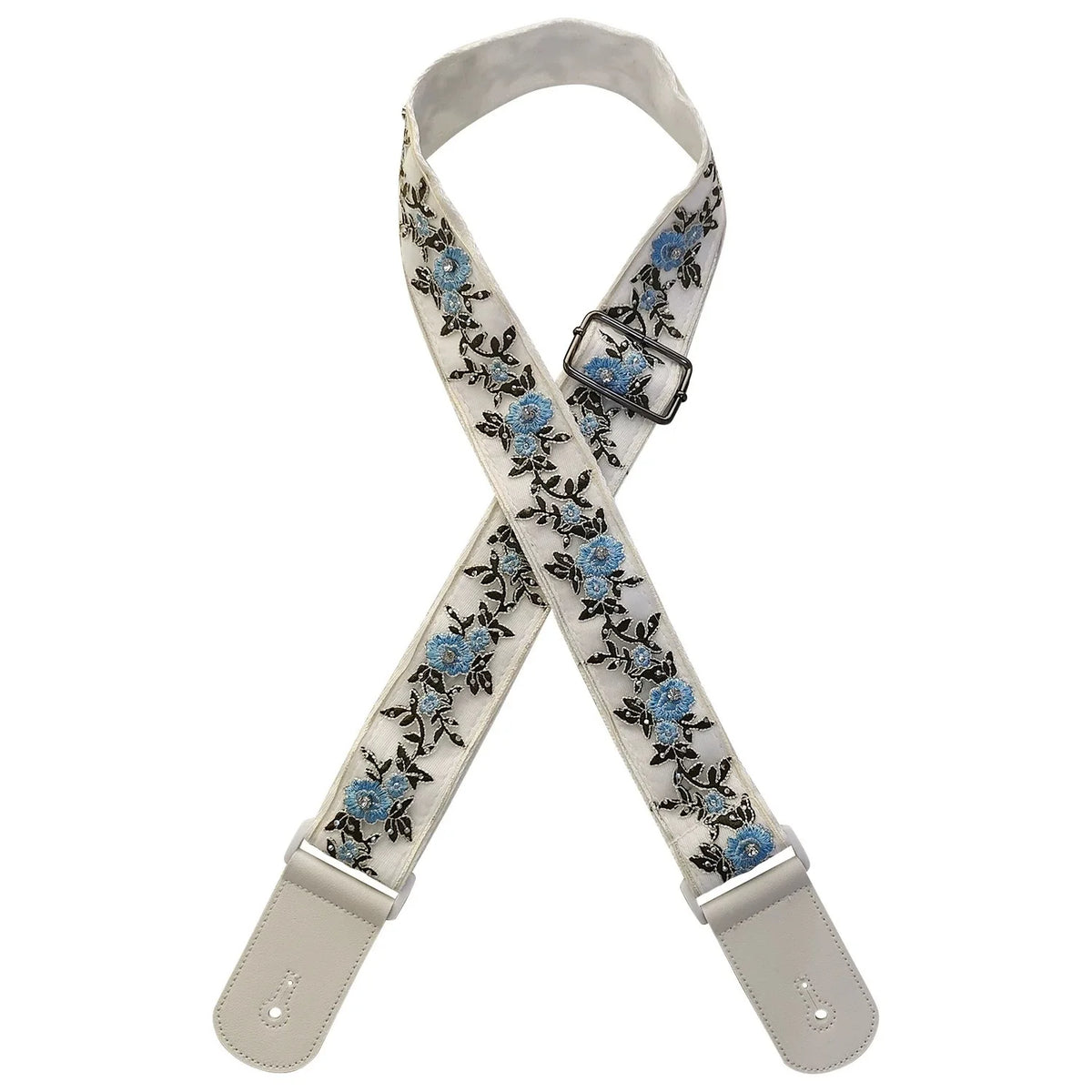 A beige woven guitar strap with blue floral embroidery and leather accents.