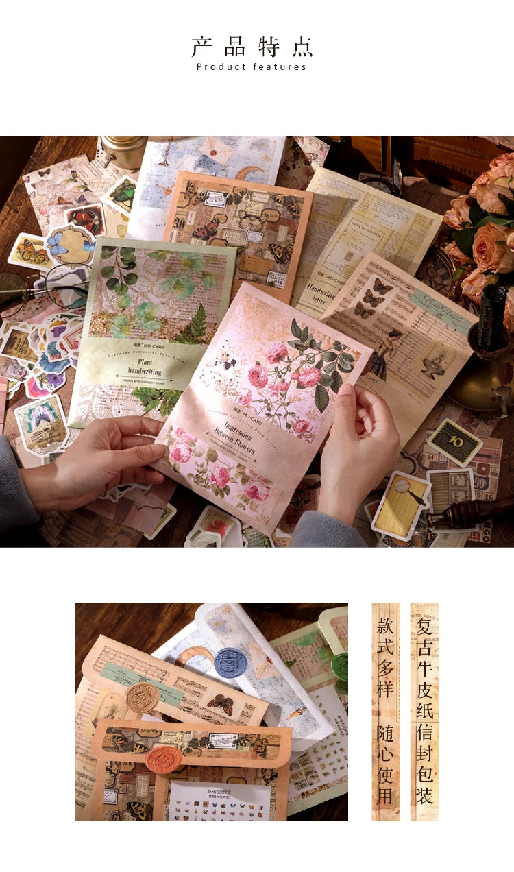 A hand is holding a vintage sticker and paper combo kit for crafting, featuring various aged papers and stickers.