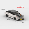 A scale model of a white and black classic supercar car building block set.