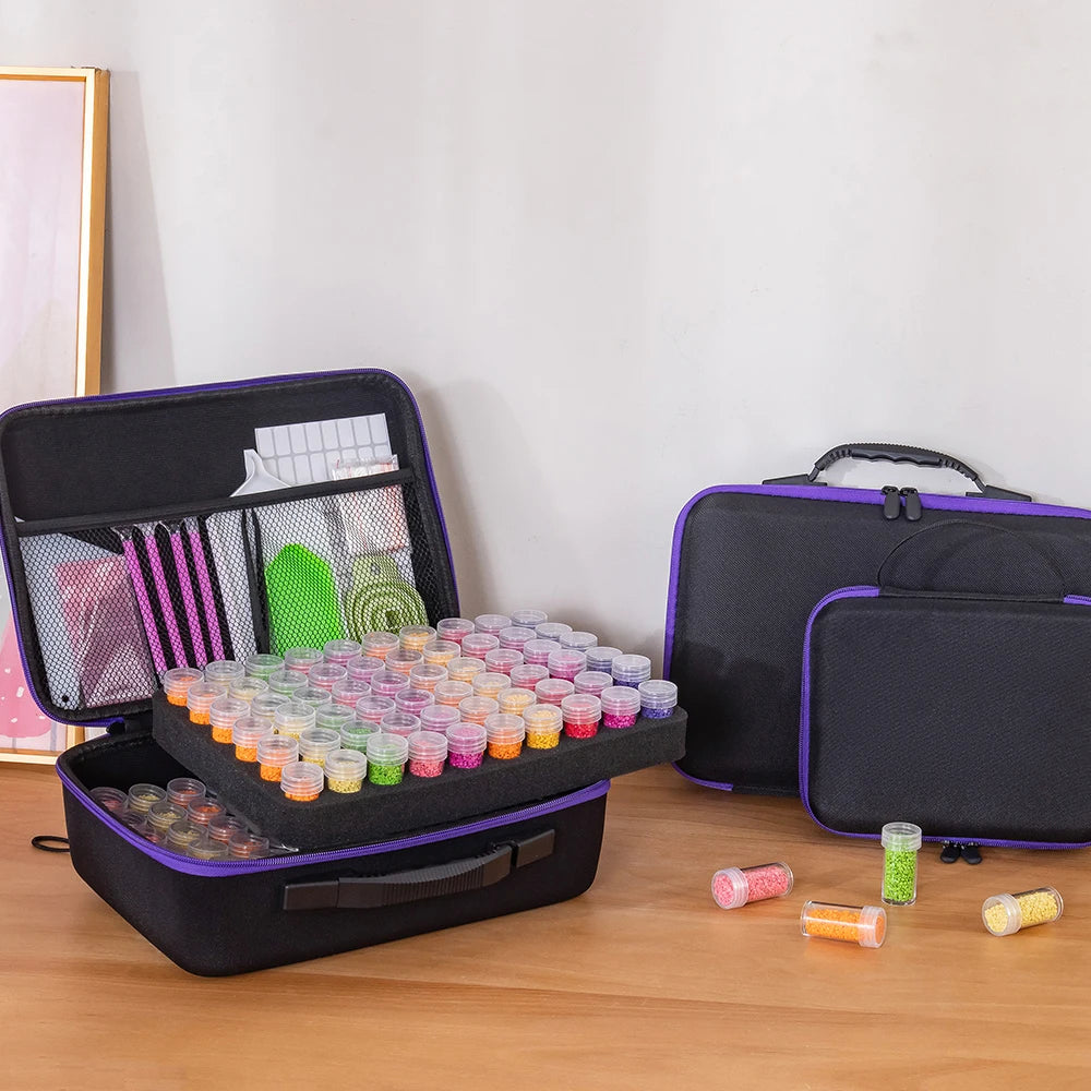 A black storage container for Diamond Art supplies featuring multiple organizer trays and tools.