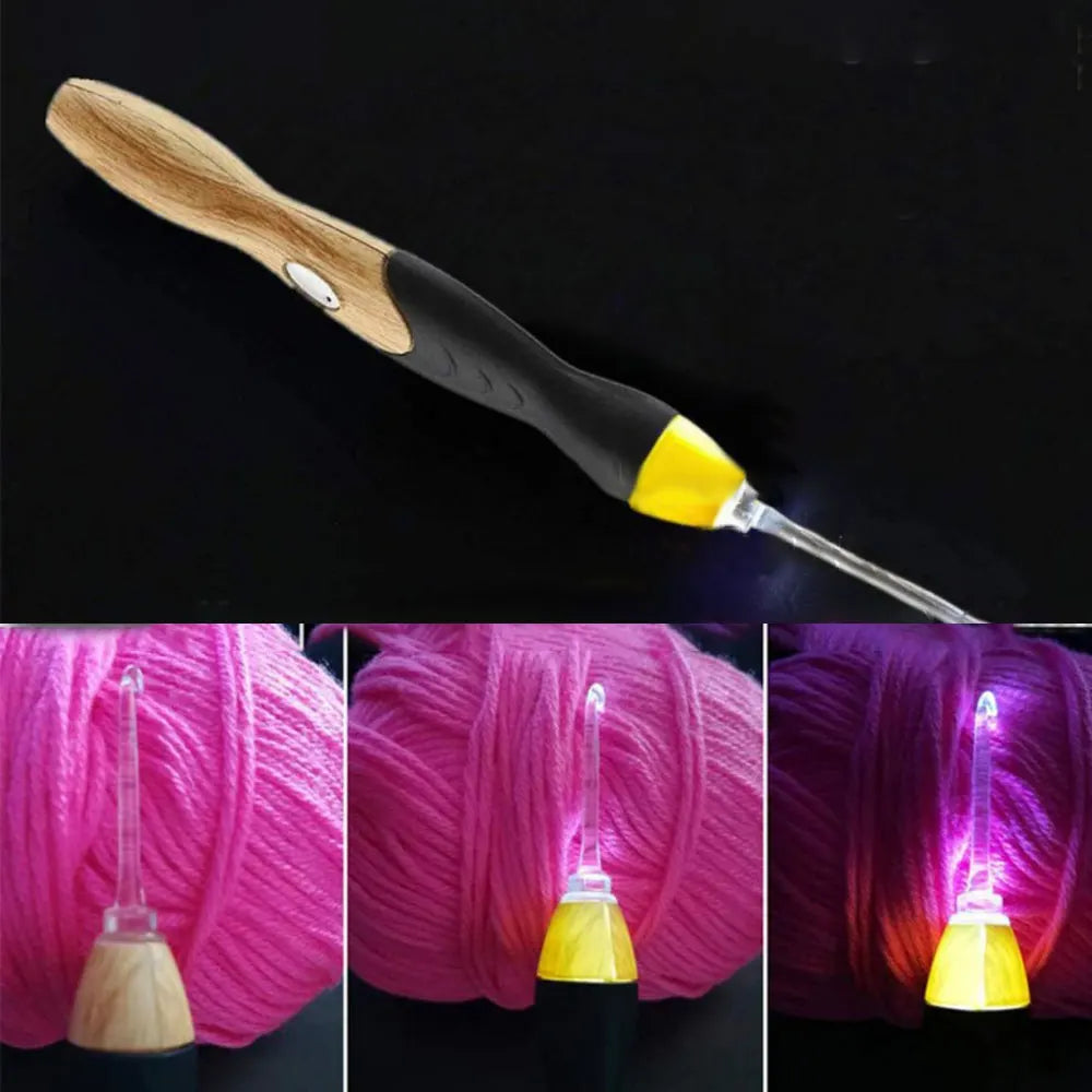 A wooden and black LED crochet hook set with interchangeable yellow tips shown against a pink yarn background.