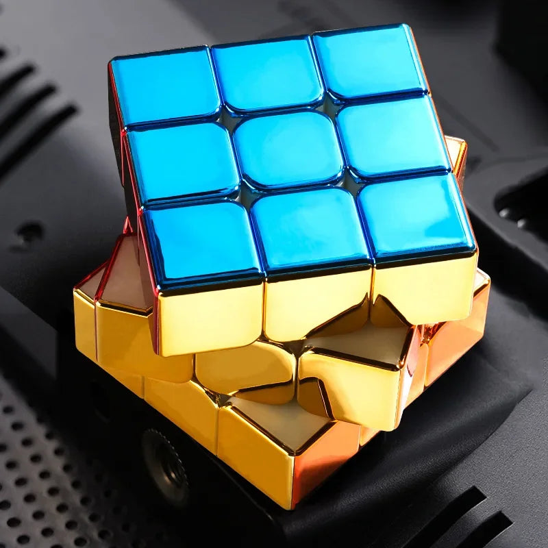 A magnetic 3x3 speed cube with blue and gold stickers resting on a black surface.