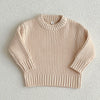 A light beige knit baby pullover sweater for boys and girls shown flat lay.
