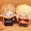 A pair of plush dolls depicting Leon and Ashley from Resident Evil 9