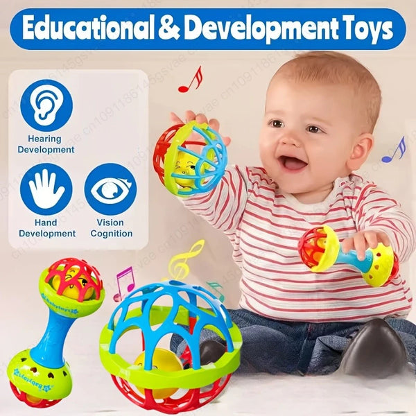 A baby is playing with two colorful developmental toys, including a ball and a rattle.