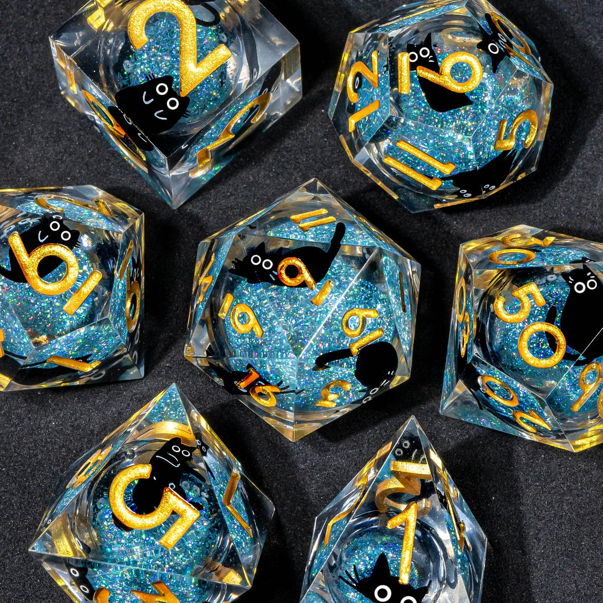 A collection of handmade liquid core resin dice set with sharp edges, featuring various numbers and symbols in blue glitter.