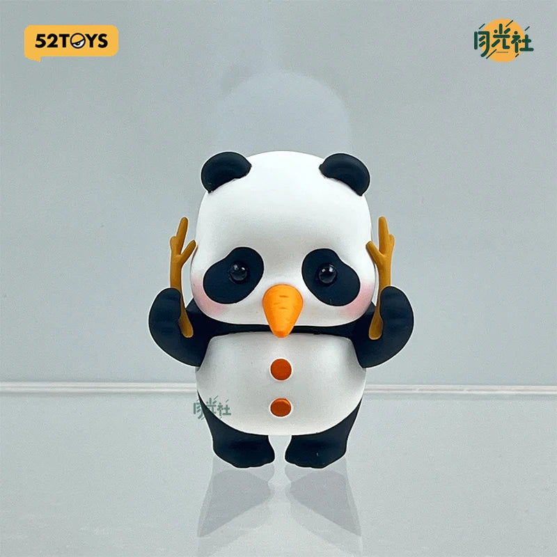 A white and black panda collectible figure with orange accents, displayed against a light gray background.
